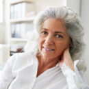 smiling-mature-professional-businesswoman-with-arm-CX6NLD3 smiling-mature-professional-businesswoman-with-arm-CX6NLD3